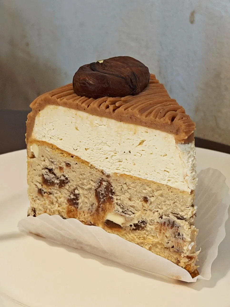 A slice of mont blanc cheesecake