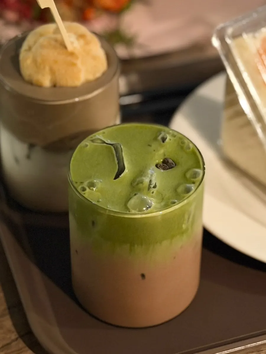 Matcha cream choco latte topped with cream