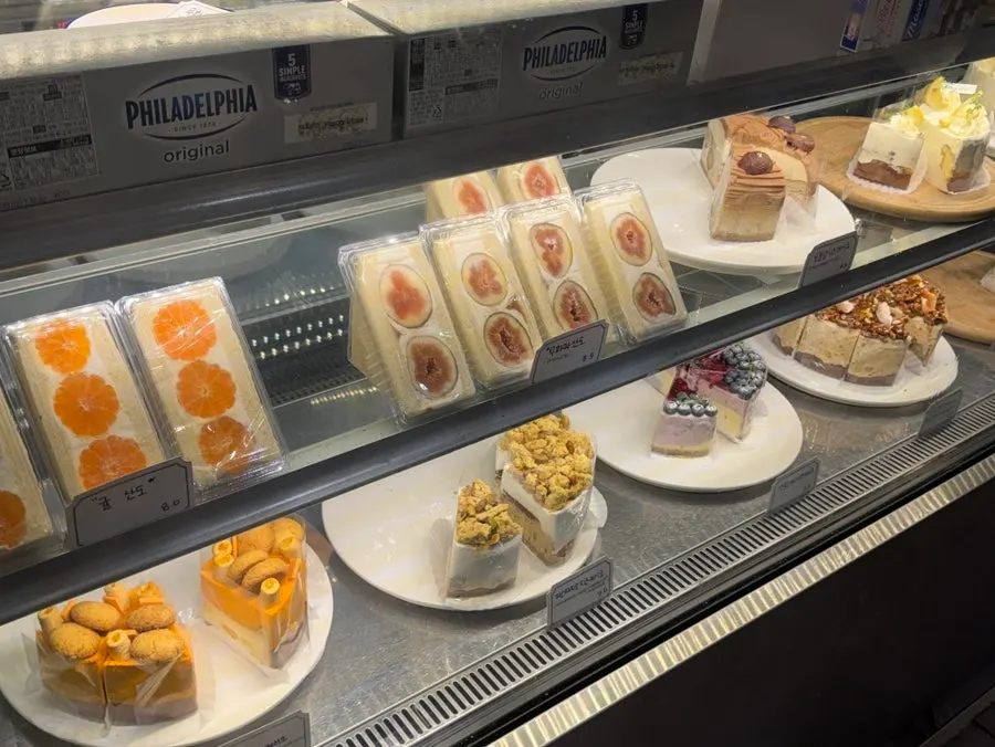 Baked goods display covered with glass domes