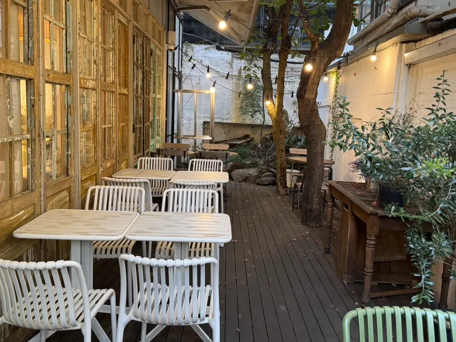 Second-floor seating with 2-person and 4-person tables