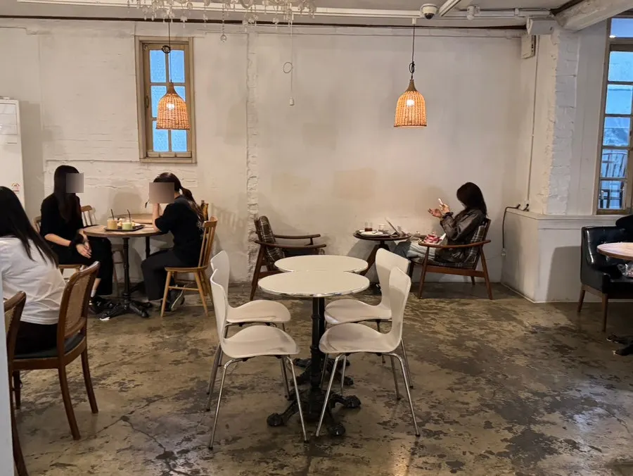 Terrace seating on the second floor of Something About Coffee