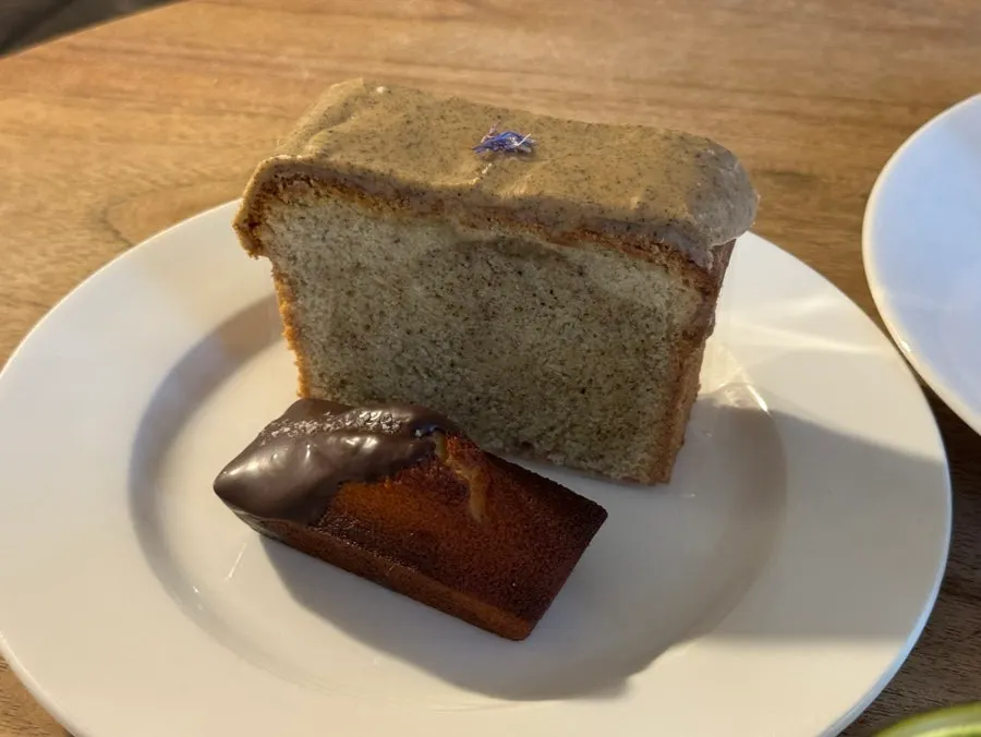 A slice of Mont Blanc cheesecake topped with chestnut cream