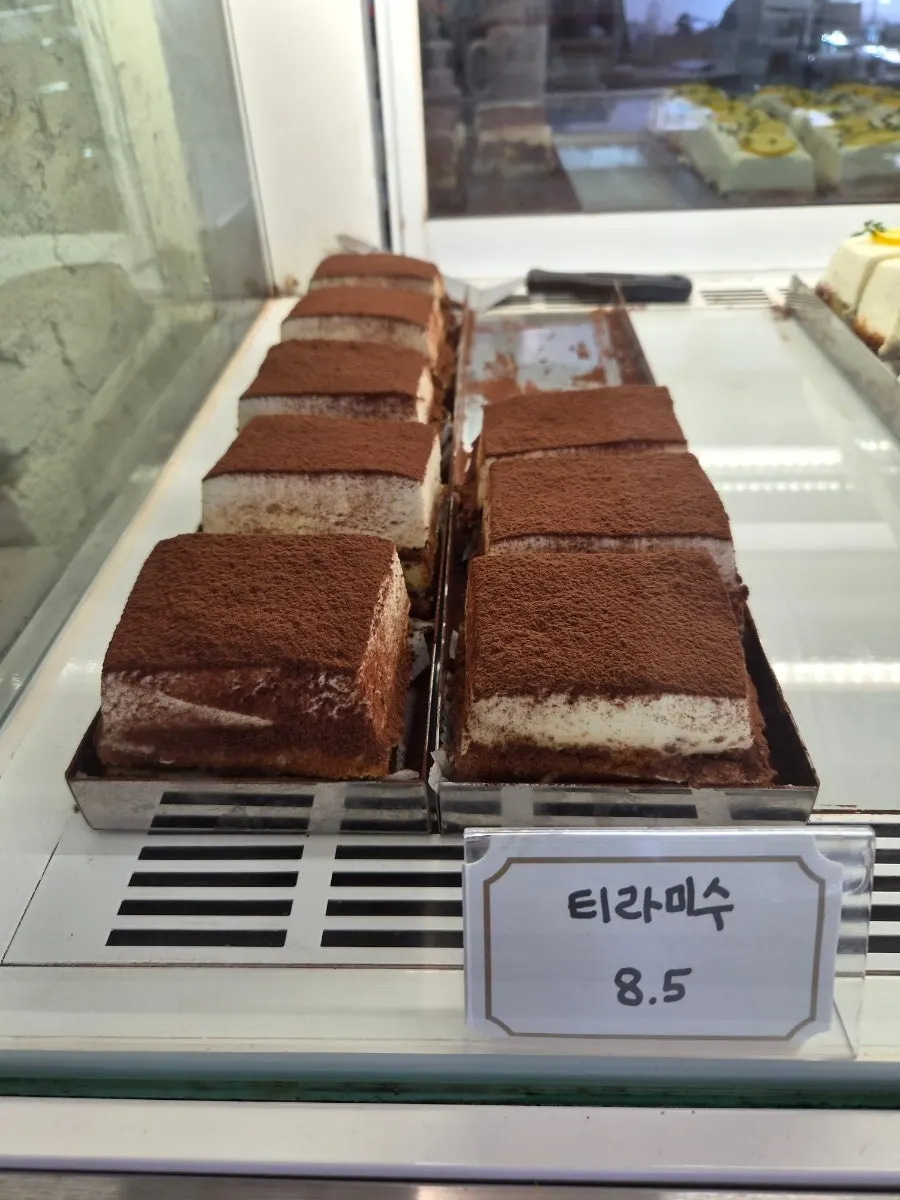 Close-up of individual desserts on display