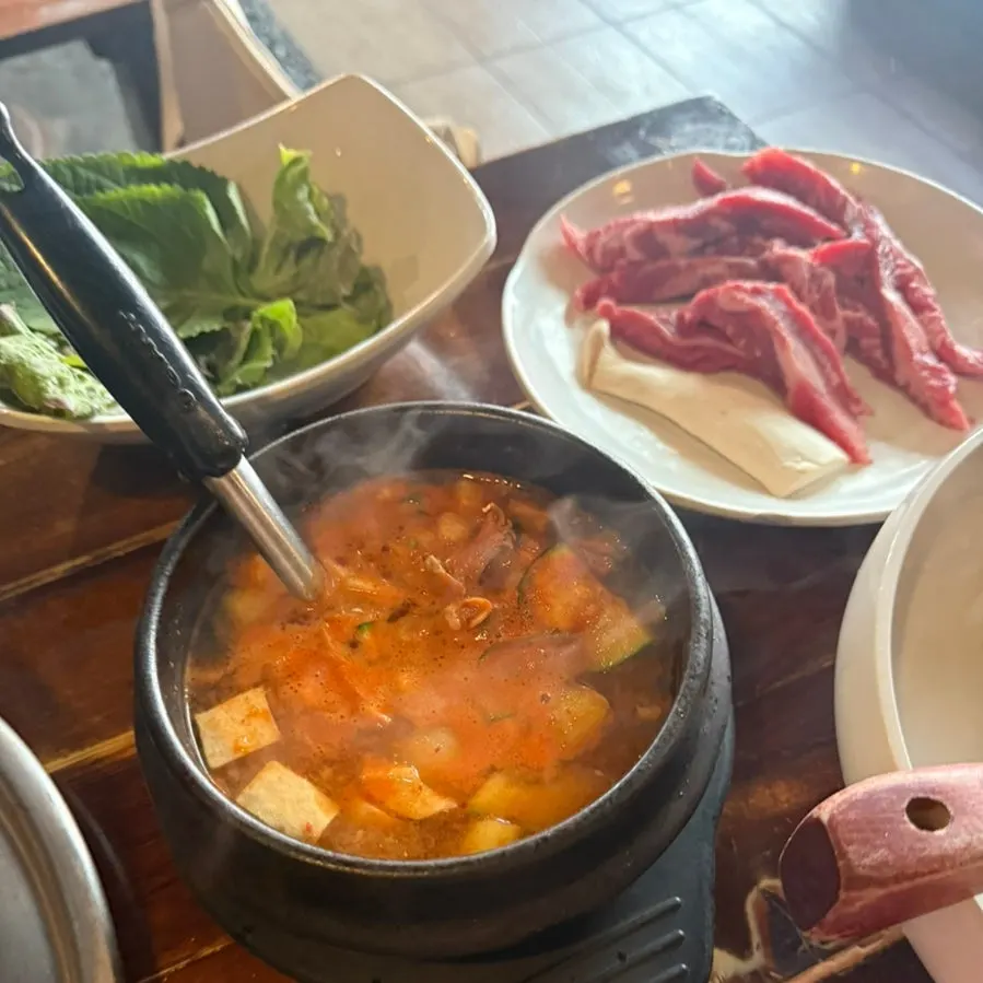 Earthenware stew filled with ingredients