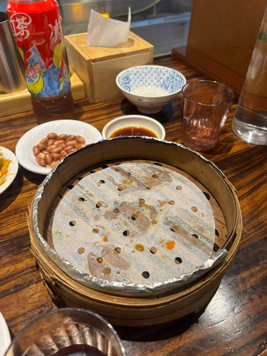 A nearly empty shumai plate