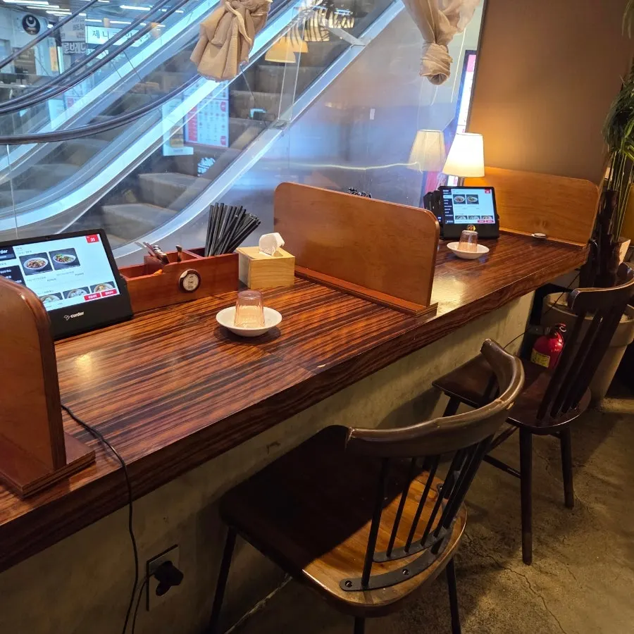 Interior of Sinbok Myeongwan with tablet ordering