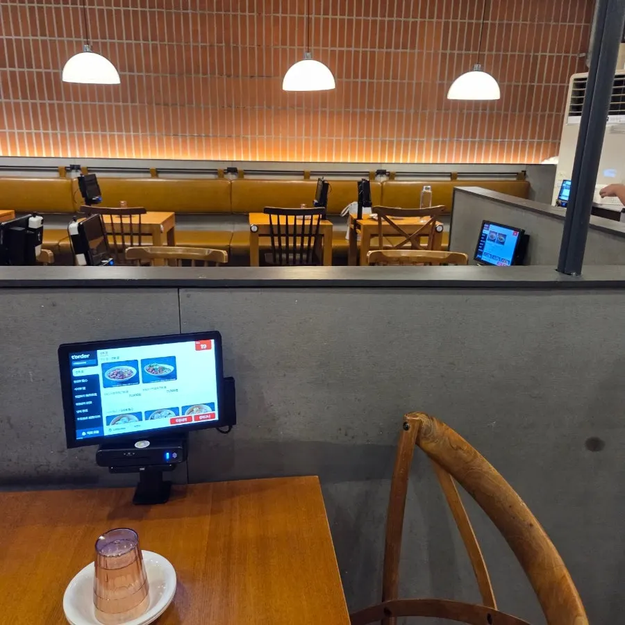 Separated four-top and two-top tables