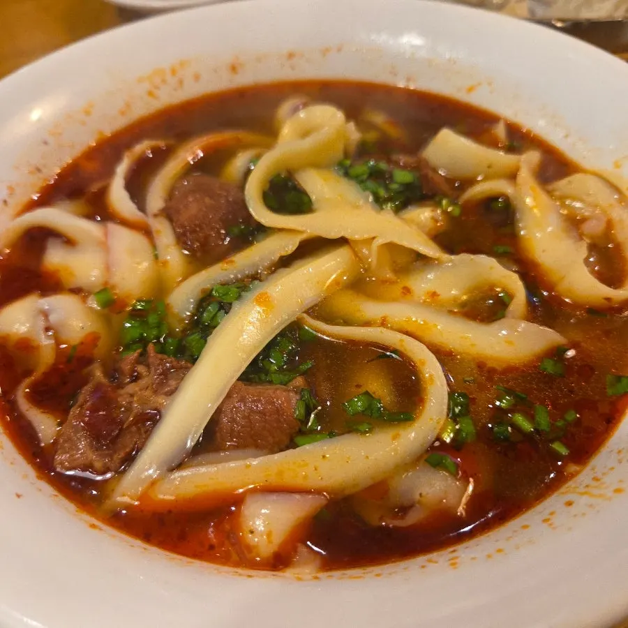 Dosakmyeon noodles and beef coated in broth