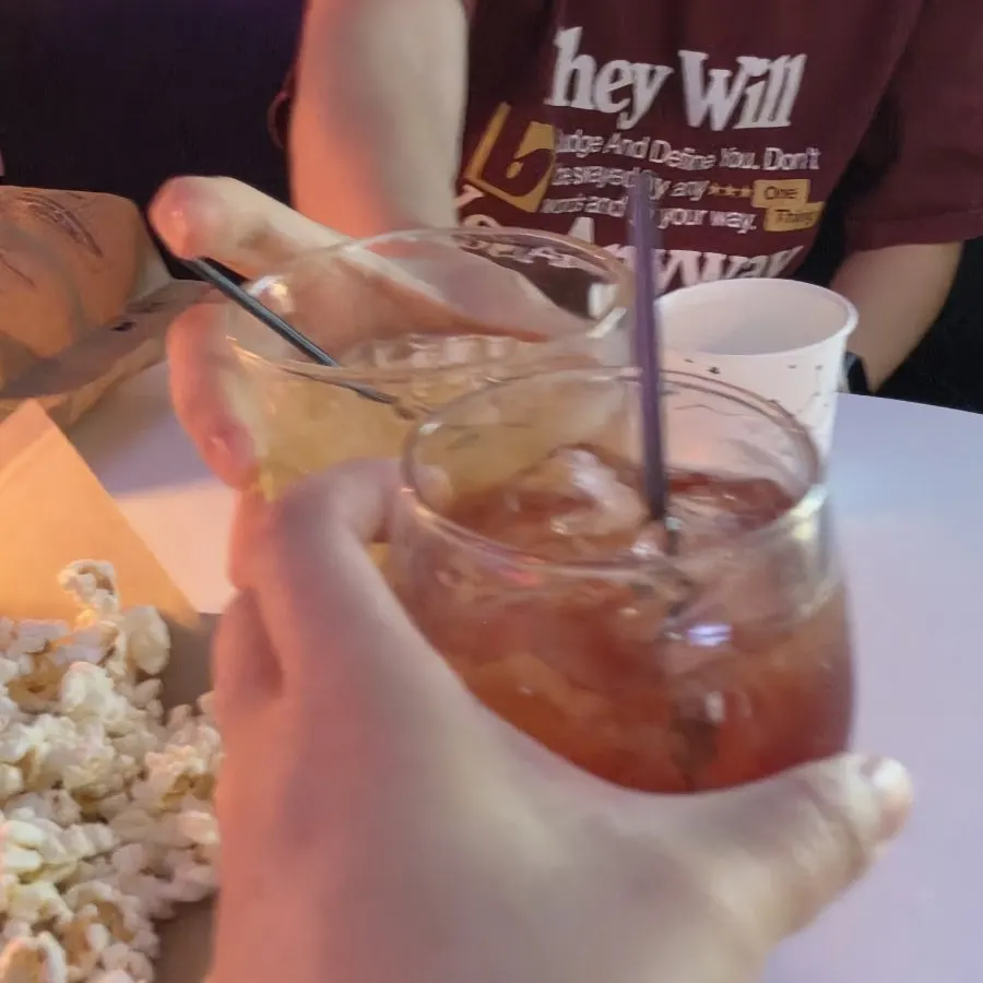 A reddish-toned glass of Cosmopolitan