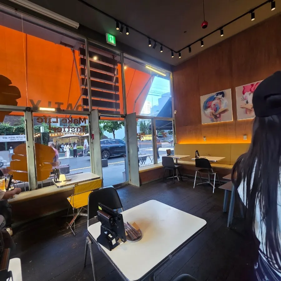 Spacious interior of Daily Fix with fully open front windows