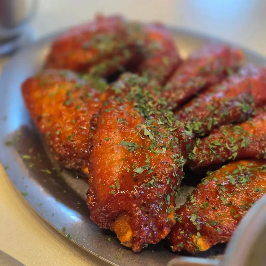 Close-up of a juicy, tender hot wing