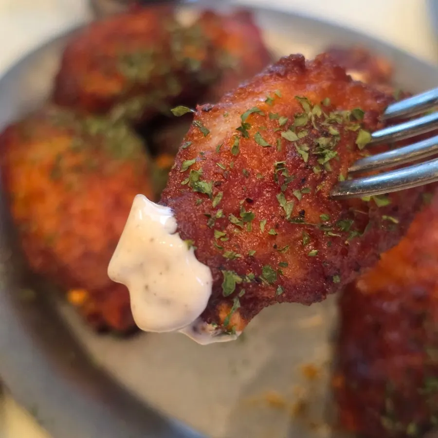 Sauce-coated hot wings from Daily Fix