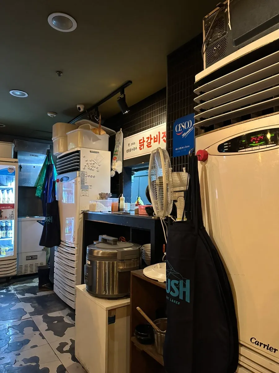 Interior of Dakgalbijeon Gangnam Branch with dim lighting