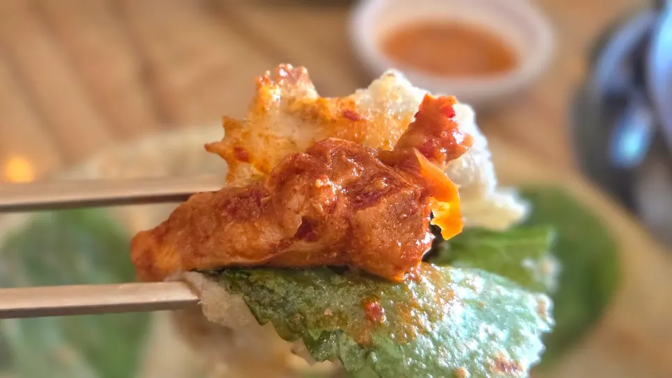 Close-up of dakgalbi soaked in seasoning