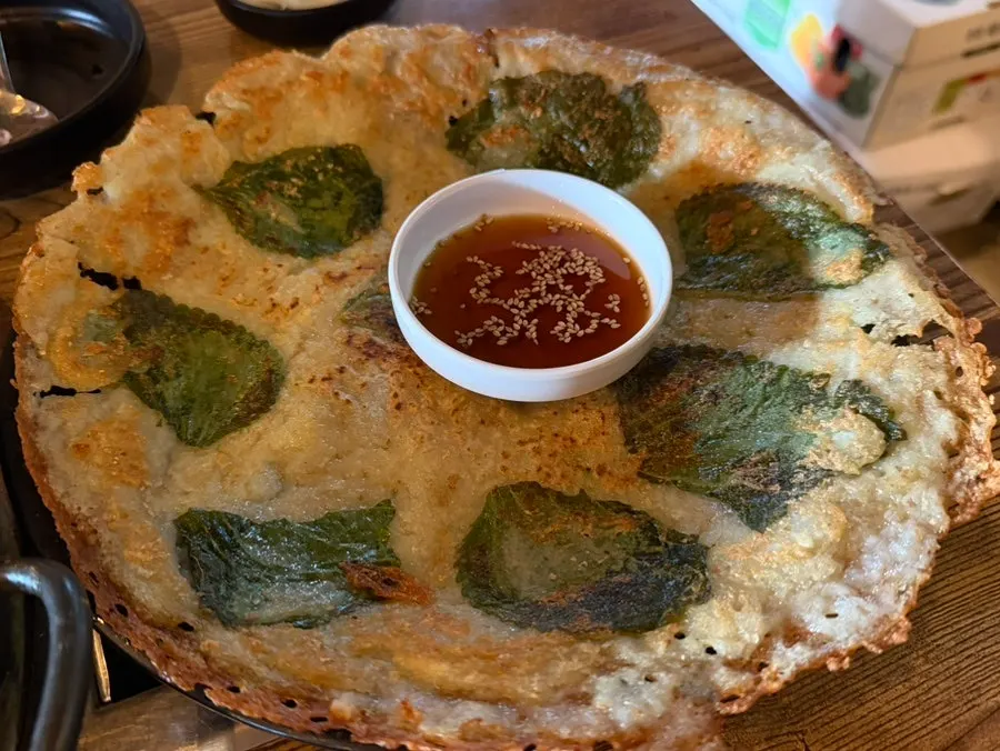 A cheese-coated piece of dakgalbi