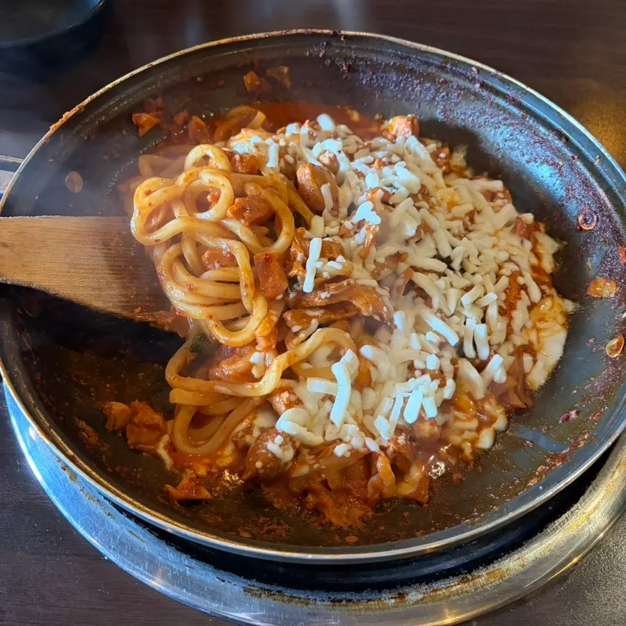 Dakgalbi piled high with mozzarella cheese