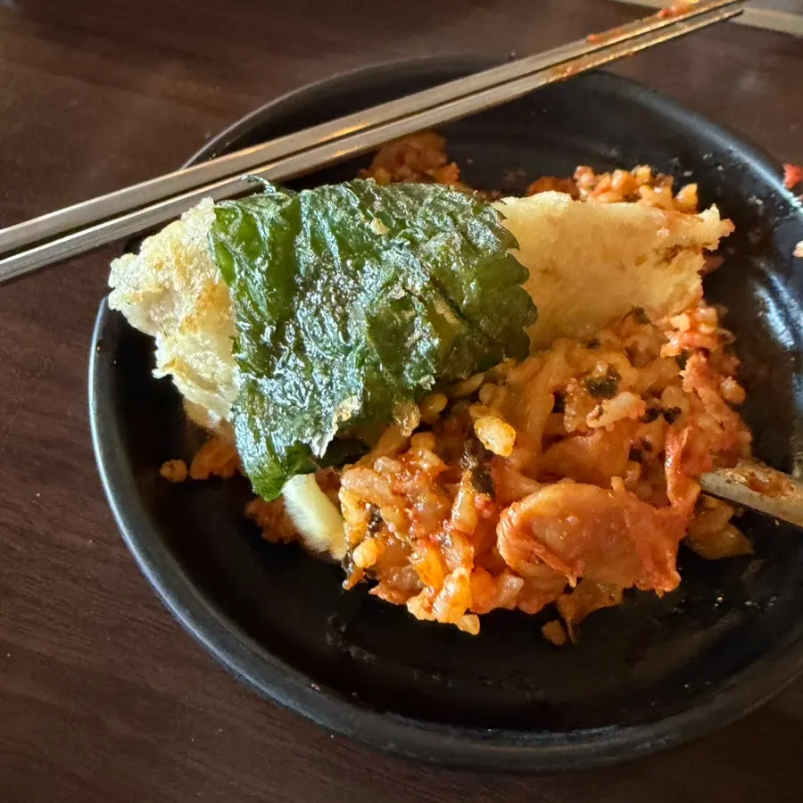 Side dish topped with gim flakes and flying fish roe