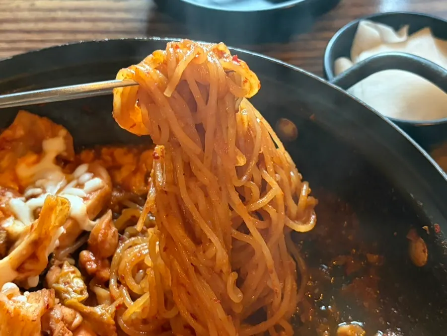 Jjolmyeon noodles mixed into the dakgalbi sauce