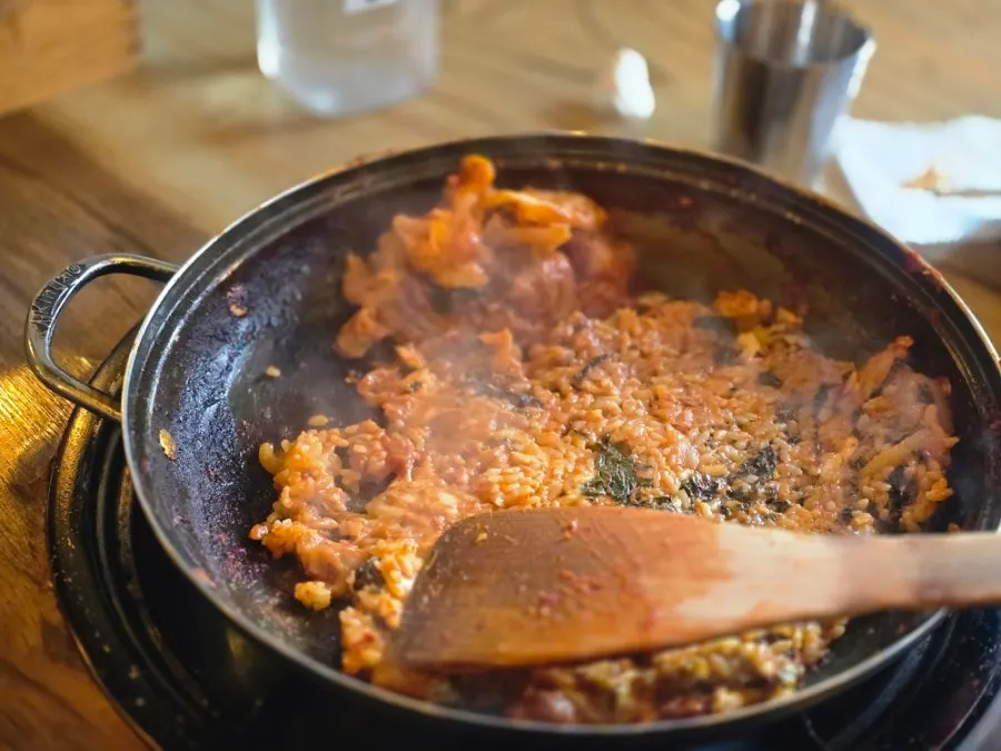 A piece of perilla potato pancake with crispy edges
