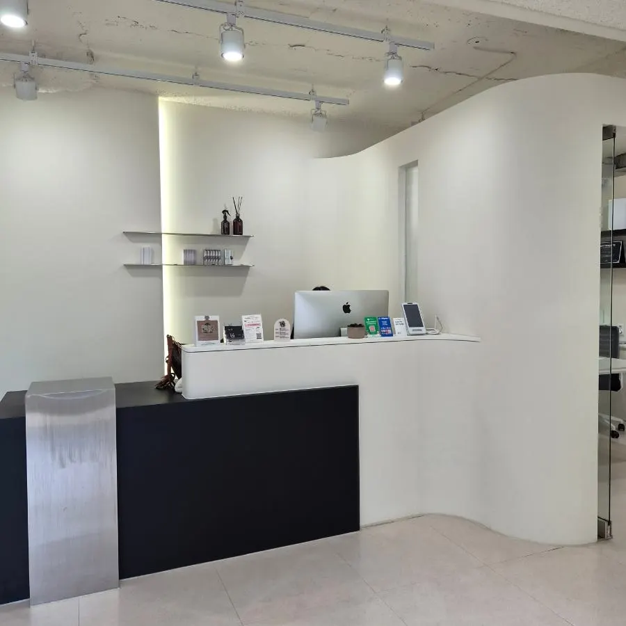 Wide, clean overview of the salon's waiting area