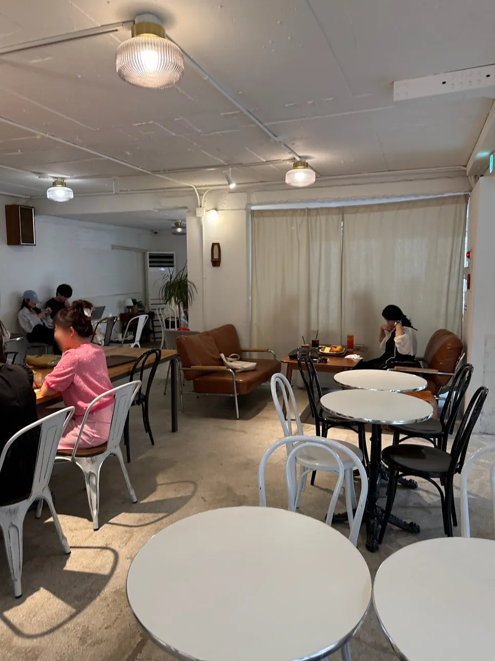 Window-side table seating on the 2nd floor
