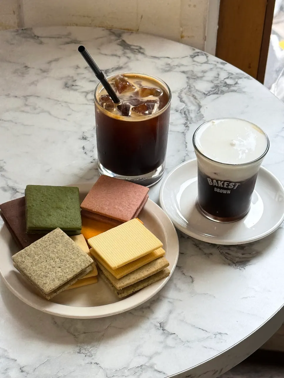 Gangnam Sand and coffee placed on a 3rd floor window seat