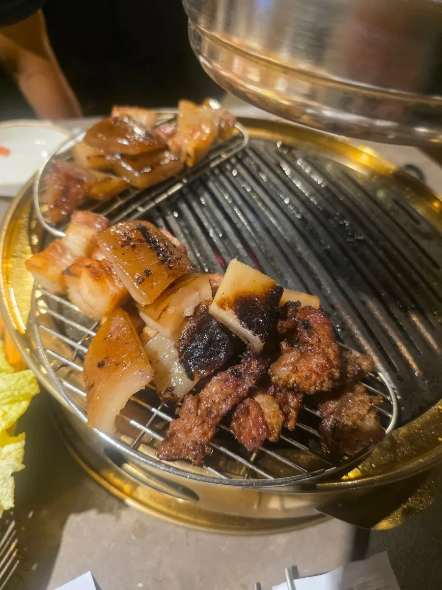 Wrapping pork belly in naengmyeon noodles