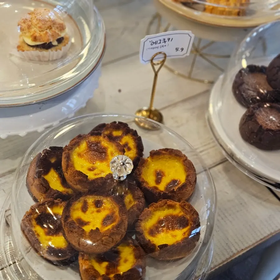 Bakery desserts arranged in the display case
