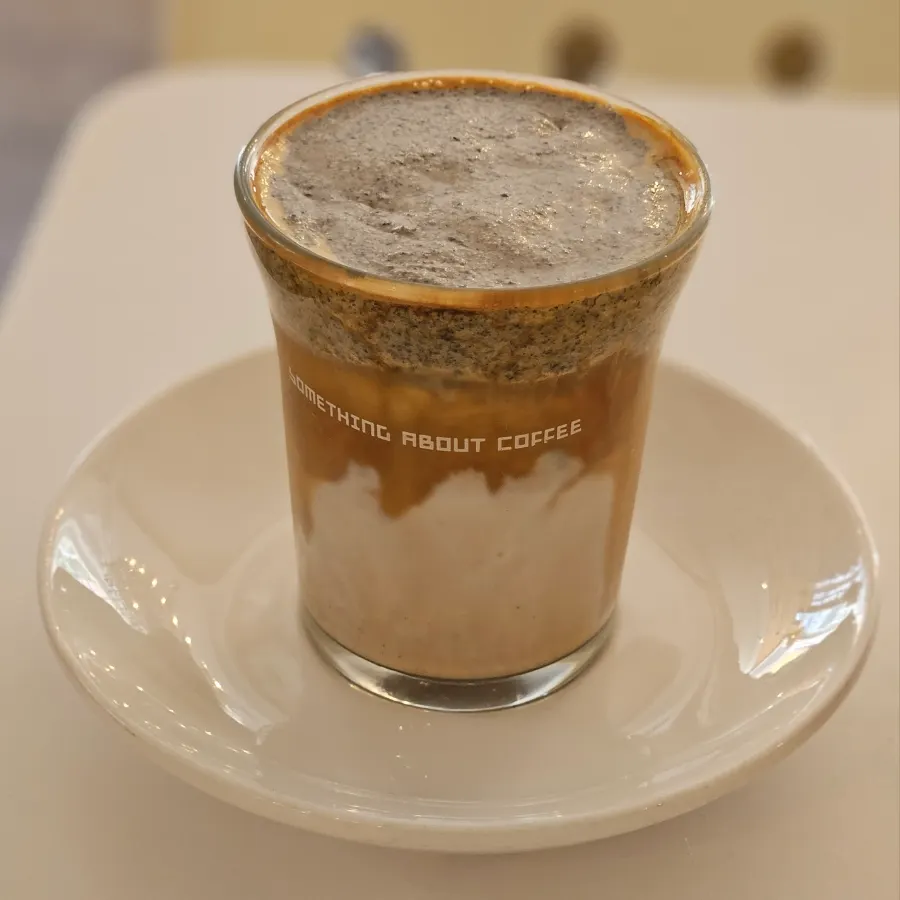 Black sesame latte and americano side by side