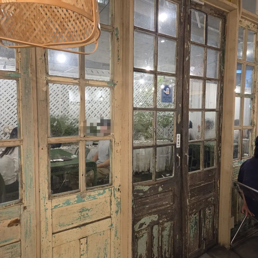Terrace-style seating on the 2nd floor made to look like outdoor space