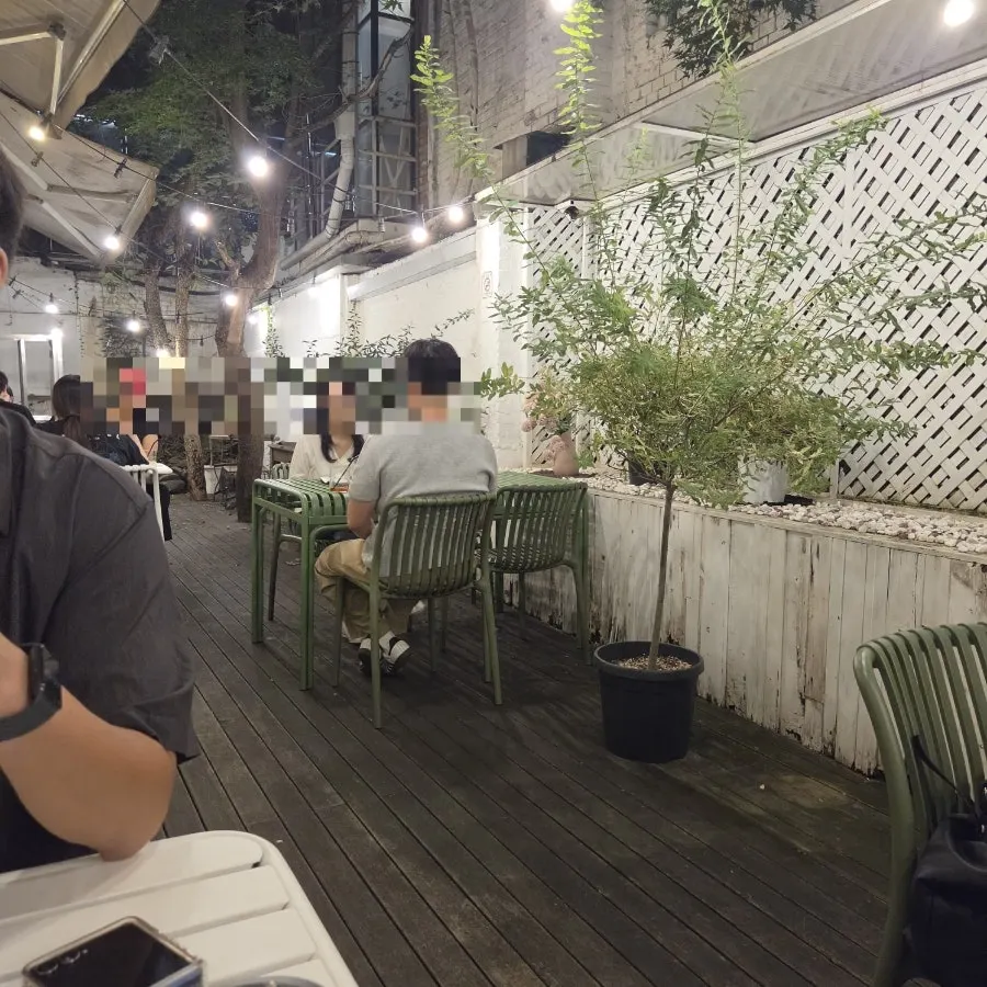Outdoor table seating under an awning