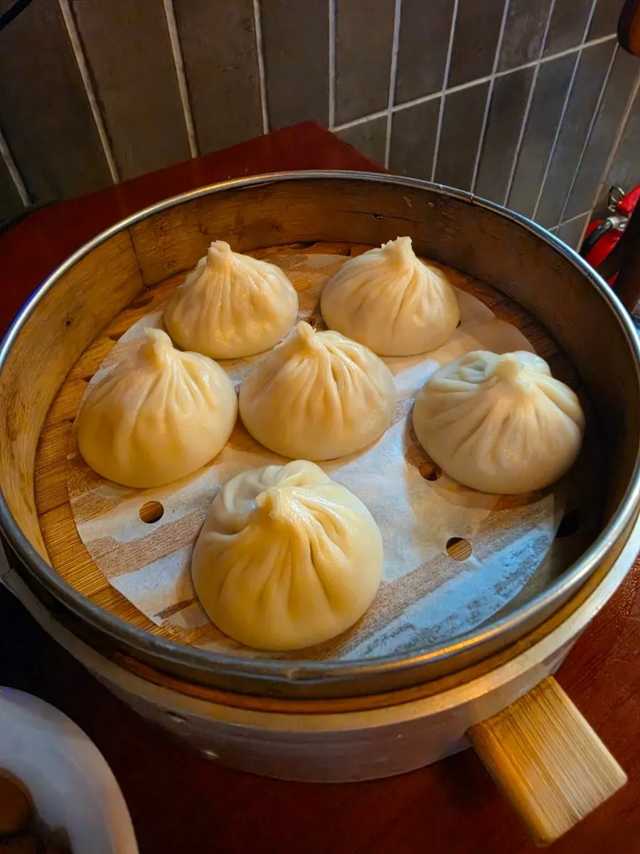 Xiaolongbao served in a steamer basket