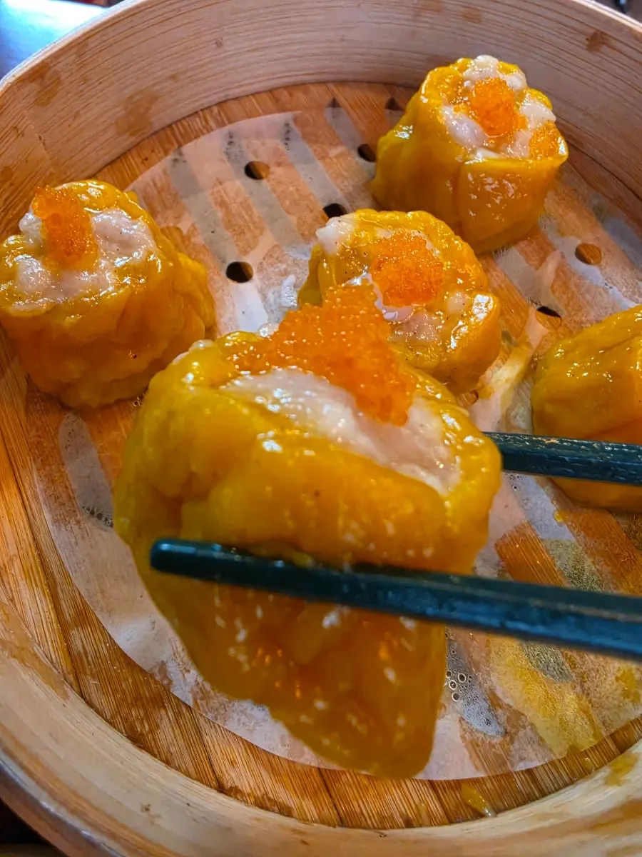 Shrimp shaomai topped with flying fish roe