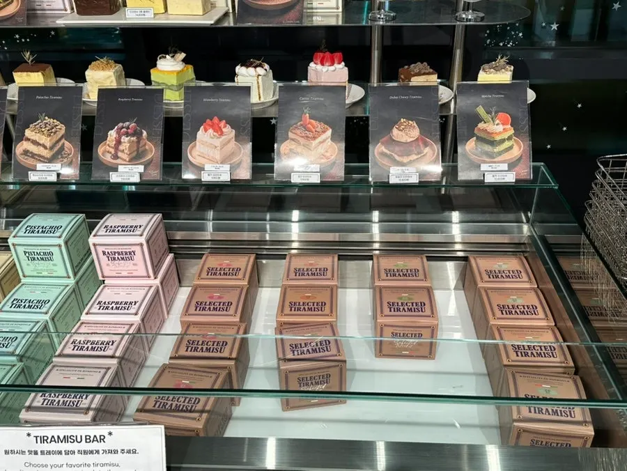 Display case with the Dubai chewy tiramisu price tag