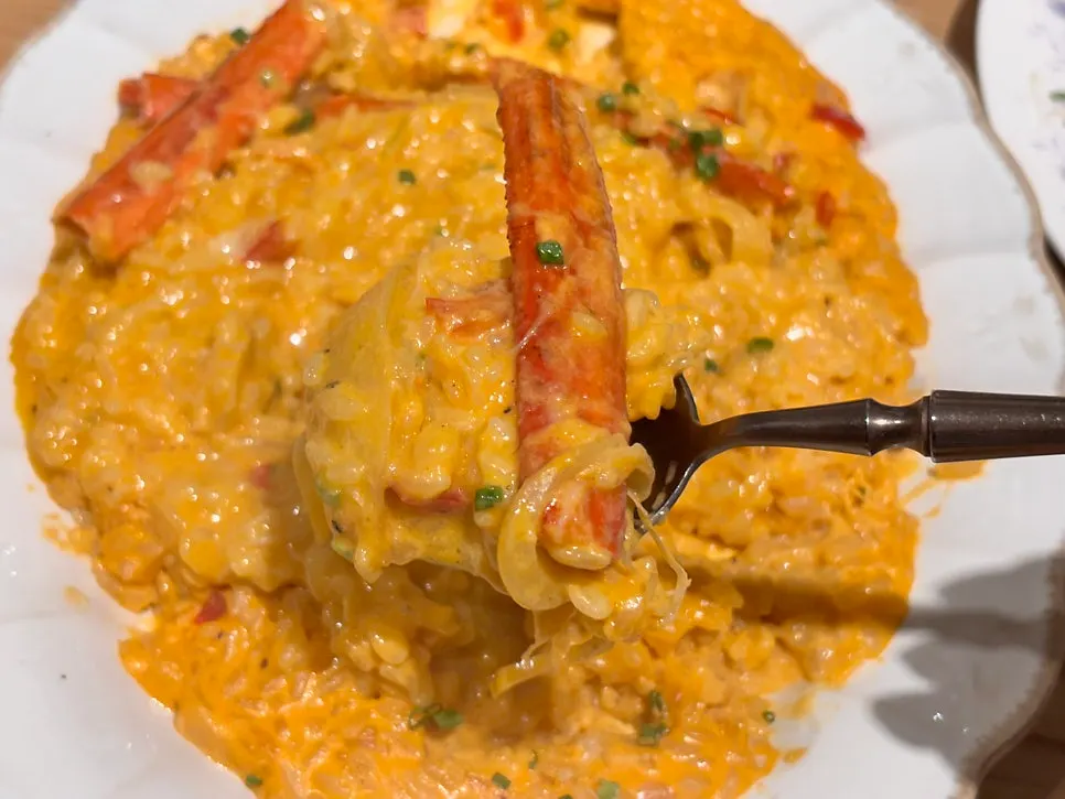 Picking meat out of the crab leg