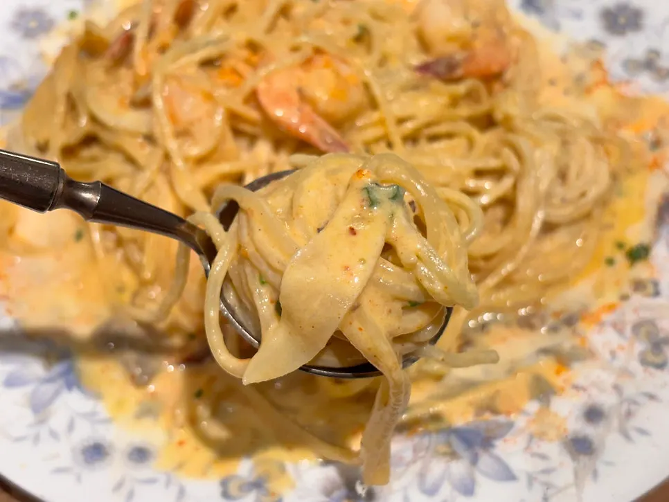 Close-up of rich, spicy cream sauce pasta