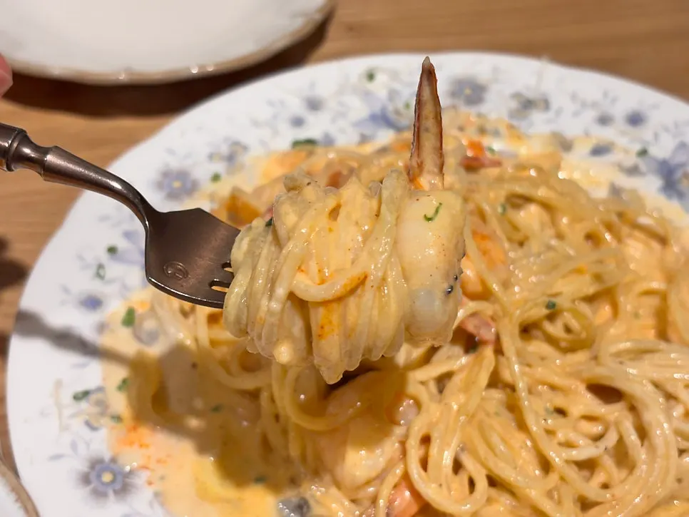 Pasta noodles coated in thick sauce