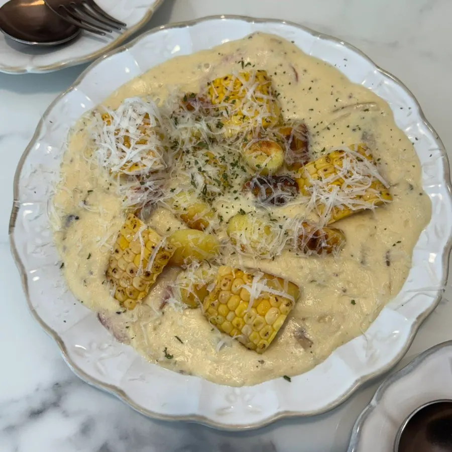Corn gnocchi with cheese and thick sauce