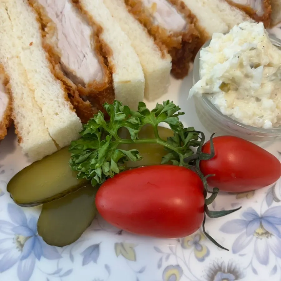 Katsu sando topped with tangy sauce