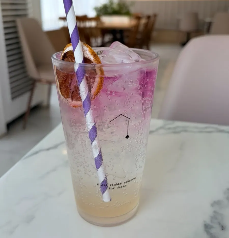 Lemon Date drink mixed into purple