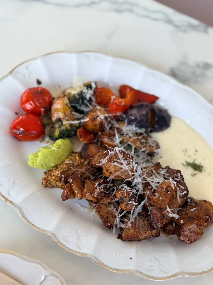 A full serving of signature pork neck steak