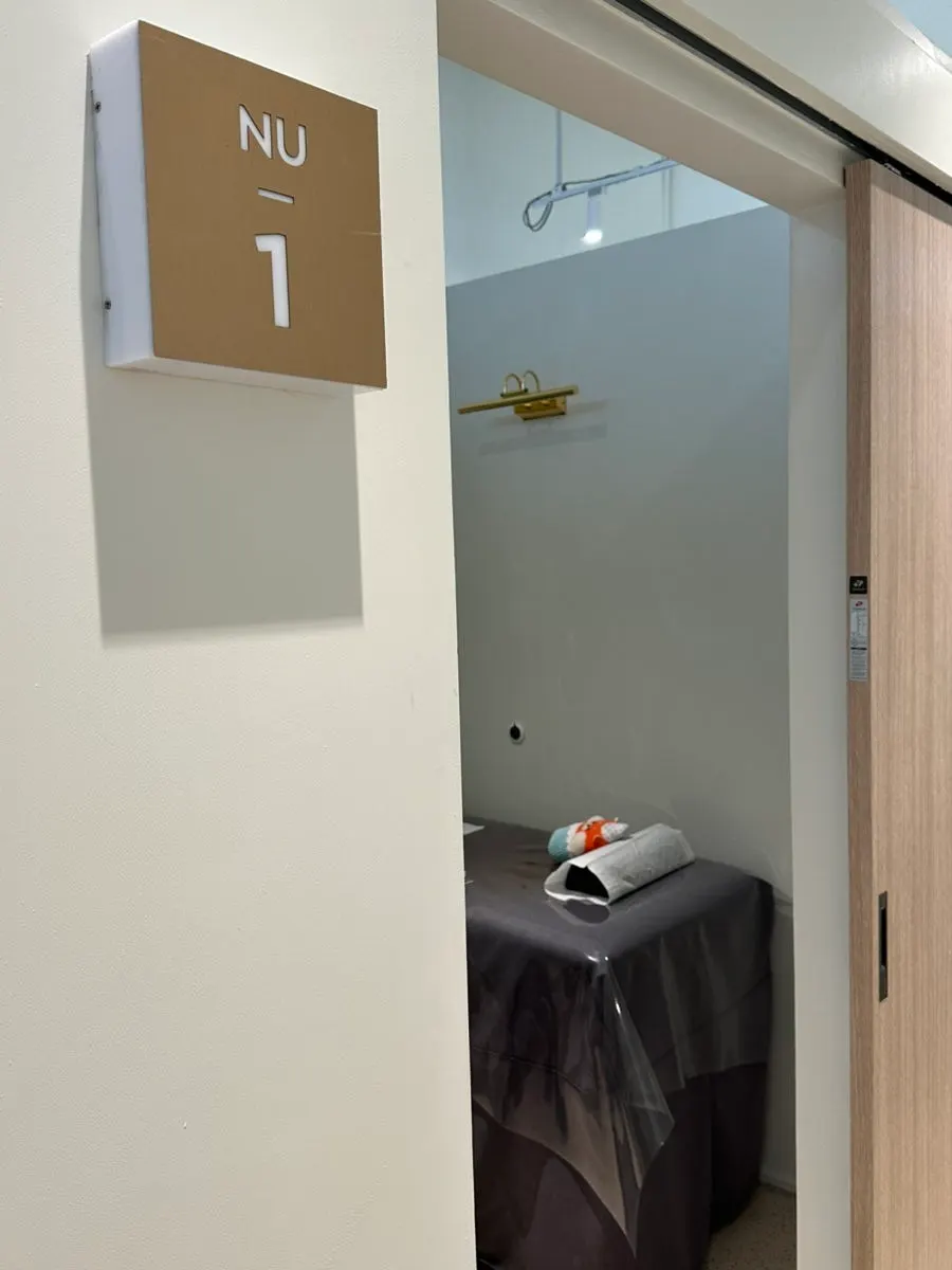 Certificates and completion certificates displayed inside the waxing salon
