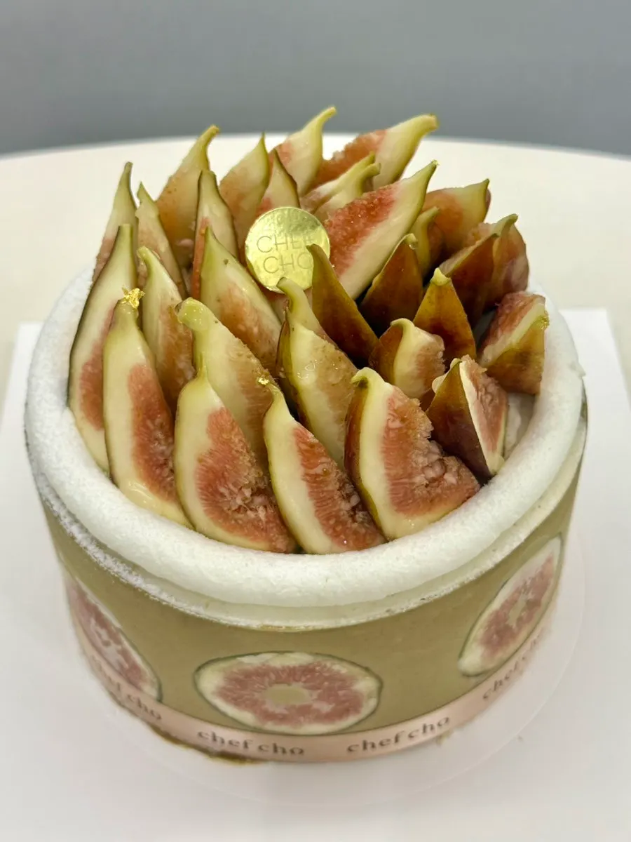Pistachio cake topped with figs