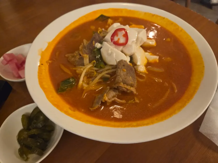 Brisket kalguksu, pot rice, and tteokgalbi dishes