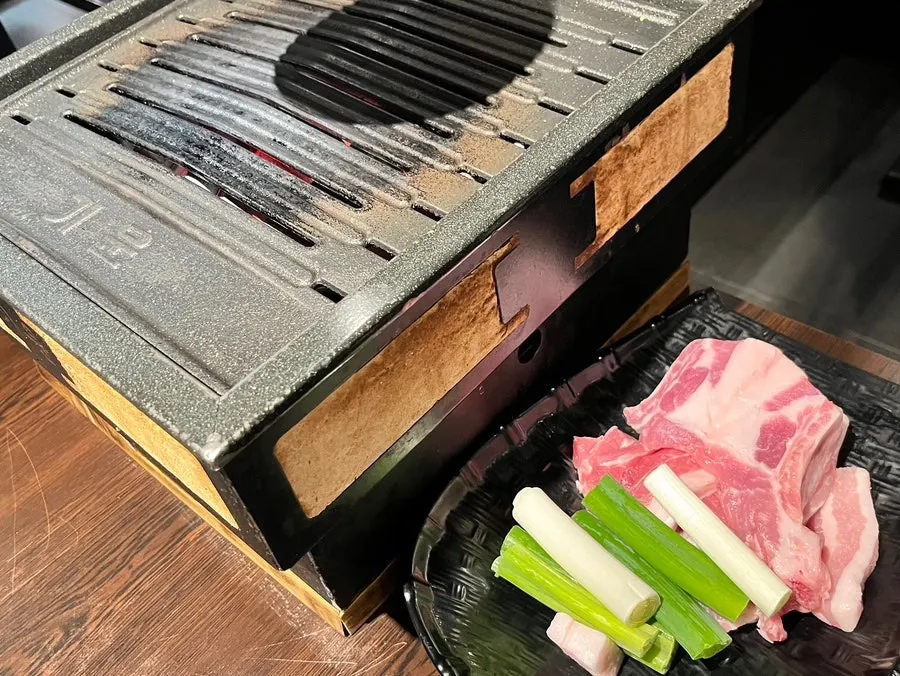 Thick raw galbi samgyeopsal served with scallions