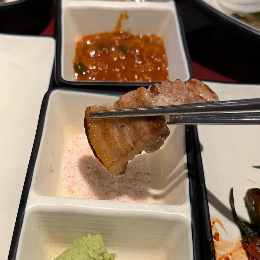 A well-browned, bite-sized piece of galbi samgyeopsal