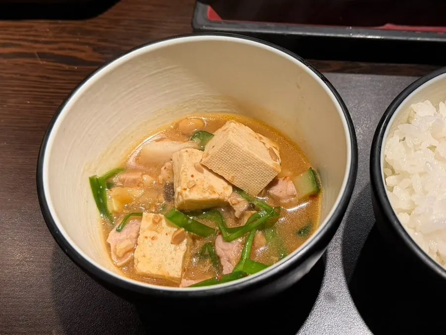 Doenjang jjigae served bubbling in a stone pot