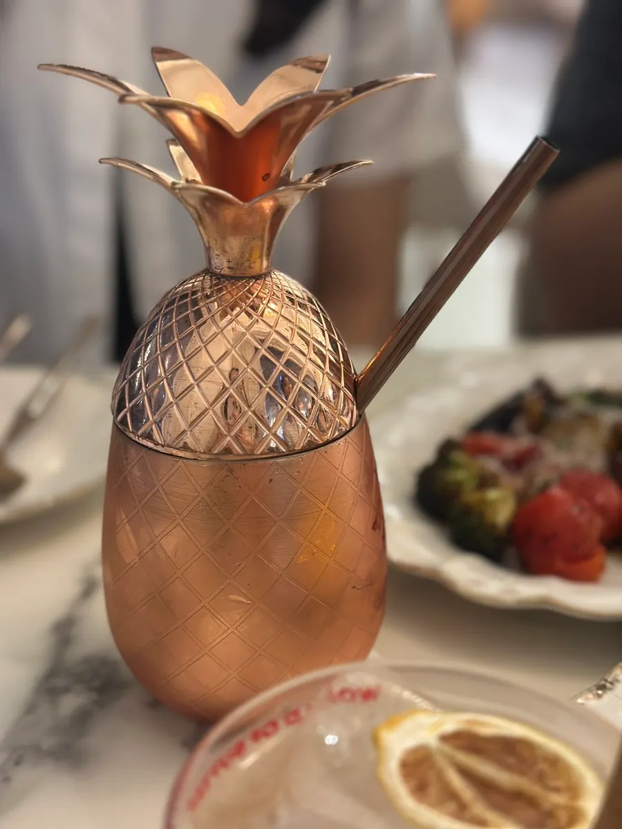 Darak Ade in a pineapple-shaped cup