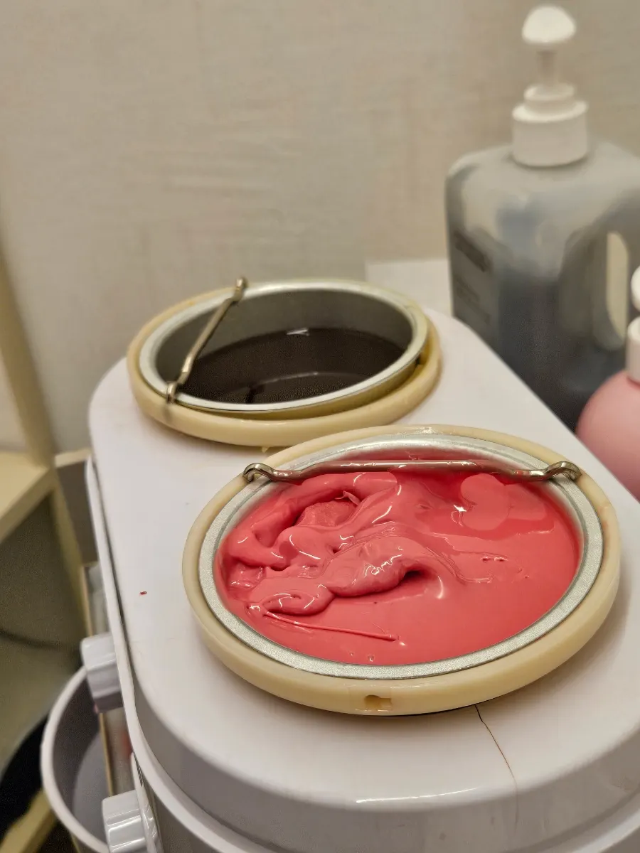 Pink-toned waxing treatment space