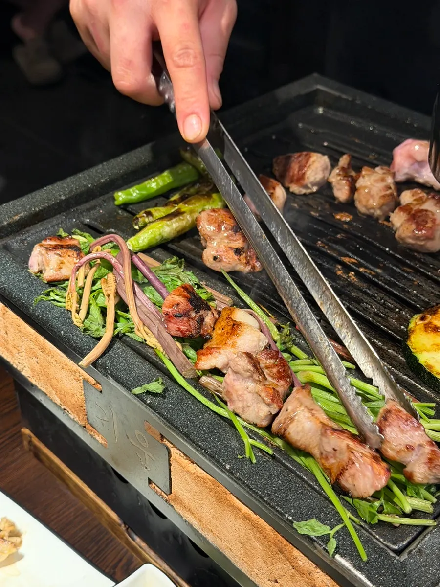 Pork neck grilling on the tabletop grill